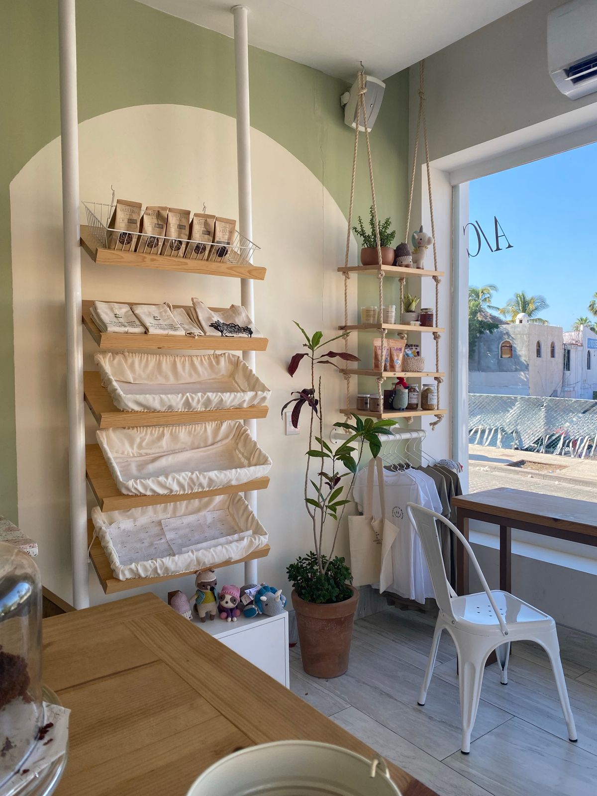 Compact local retail boutique with merchandise displays